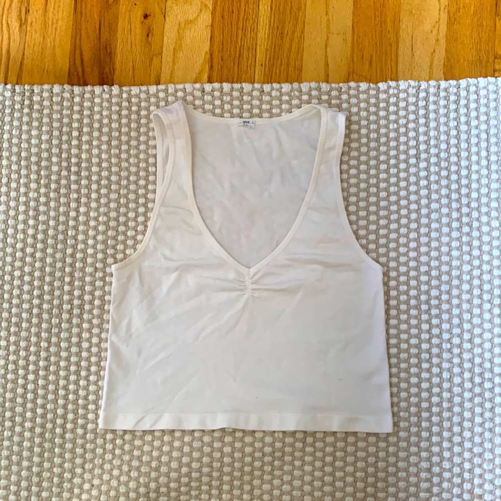 No brand, white crop tank, size might be S